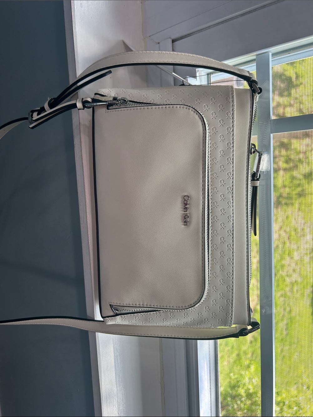 Calvin Klein Off-White Shoulder Bag with Embossed Logo